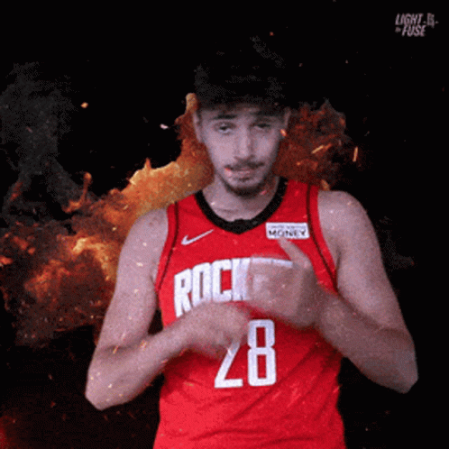 A Basketball Player Wearing A Red Jersey With The Number 28 GIF