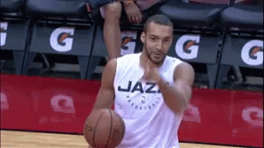 A Basketball Player Wearing A Shirt That Says Jazz Dribbles The Ball GIF