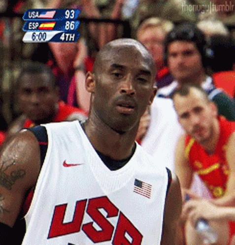 A Basketball Player Wearing A Usa Jersey Looks To His Left GIF