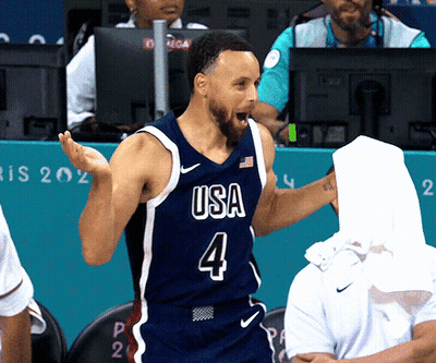 A Basketball Player Wearing A Usa Jersey With The Number 4 GIF