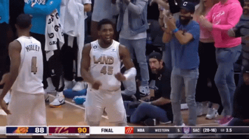 A Basketball Player Wearing A White Jersey That Says Land 45 GIF