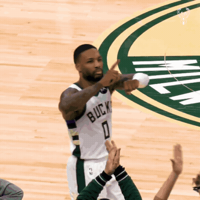 A Basketball Player Wearing A White Jersey With The Number 0 GIF
