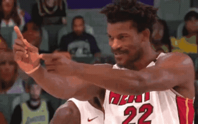 A Basketball Player Wearing A White Jersey With The Number 22 On It GIF