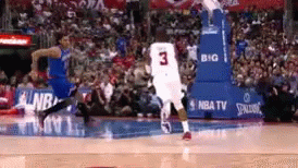 A Basketball Player Wearing A White Jersey With The Number 3 GIF