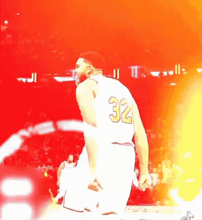 A Basketball Player Wearing A White Jersey With The Number 32 On The Back GIF