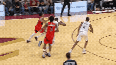 A Basketball Player Wearing A White Jersey With The Number 4 GIF