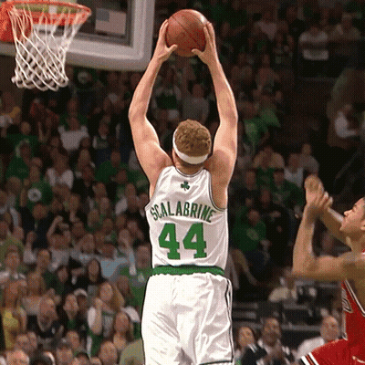 A Basketball Player Wearing A White Jersey With The Number 44 On The Back GIF