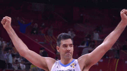 A Basketball Player Wearing A White Jersey With The Word Argentina On It GIF