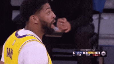 A Basketball Player Wearing A Yellow Jersey That Says Ray On It GIF