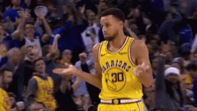 A Basketball Player Wearing A Yellow Jersey That Says Warriors On It GIF