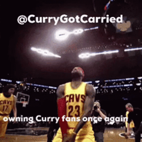 A Basketball Player Wearing A Yellow Jersey With Cavs On It GIF