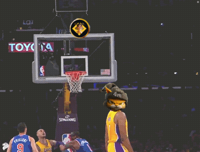A Basketball Player Wearing A Yellow Lakers Jersey Throws A Ball GIF