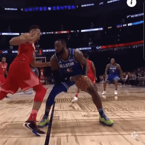 A Basketball Player Wearing An All Star Jersey Dribbles The Ball GIF