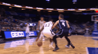 A Basketball Player Wearing Number 43 Dribbles The Ball GIF