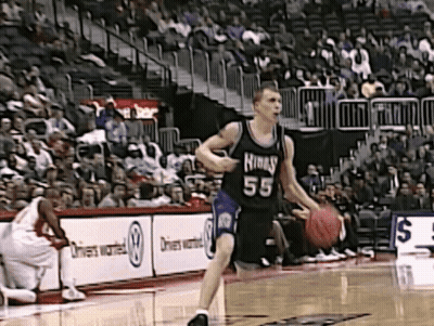 A Basketball Player Wearing Number 55 Dribbles The Ball GIF