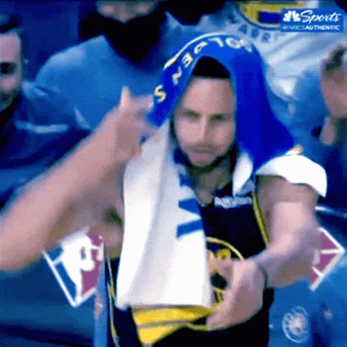 A Basketball Player With A Towel On His Head That Says ' Nbc Authentic ' On It GIF