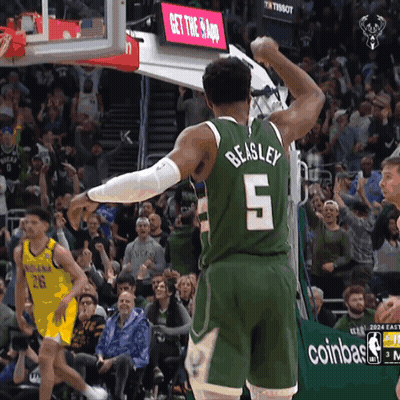 A Basketball Player With Beasley 5 On His Jersey GIF