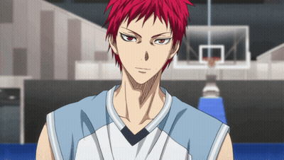 A Basketball Player With Red Hair Is Standing In Front Of A Basketball Net GIF
