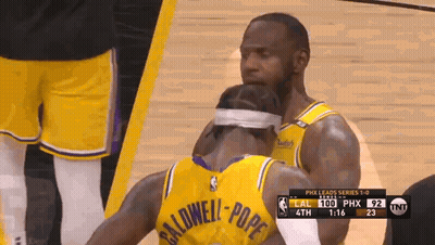 A Basketball Player With The Name Baldwell On His Back GIF