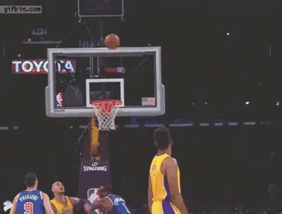 A Basketball Player With The Number 0 On His Jersey Is Jumping In The Air GIF