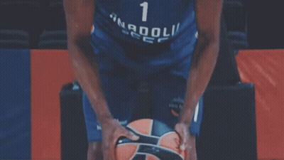 A Basketball Player With The Number 1 On His Jersey Holds A Basketball GIF