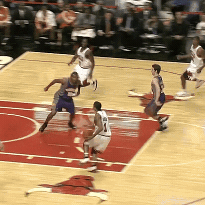 A Basketball Player With The Number 1 On His Jersey Is Dribbling The Ball GIF