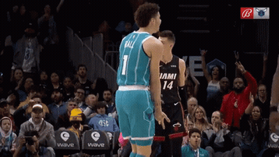 A Basketball Player With The Number 1 On His Jersey Is Standing Next To Another Player With The Number 14 On Their Jerse GIF