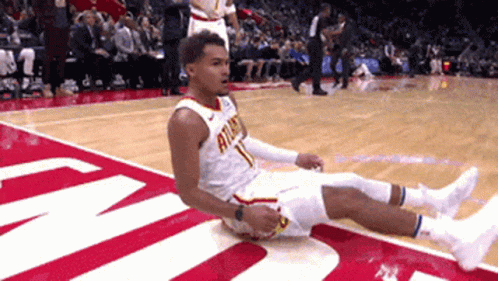A Basketball Player With The Number 1 On His Jersey Lays On The Floor GIF