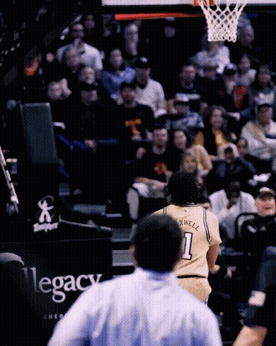 A Basketball Player With The Number 1 On The Back Of His Shirt GIF
