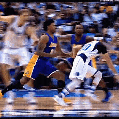 A Basketball Player With The Number 10 On His Jersey Is Being Chased By Another Player GIF