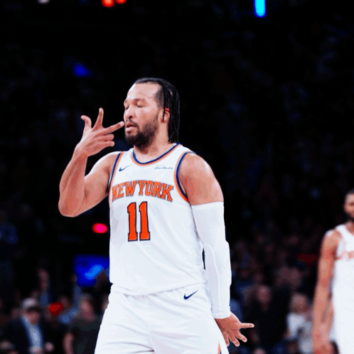 A Basketball Player With The Number 11 On His Jersey GIF