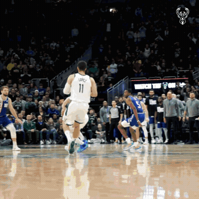 A Basketball Player With The Number 11 On The Back Of His Shirt GIF