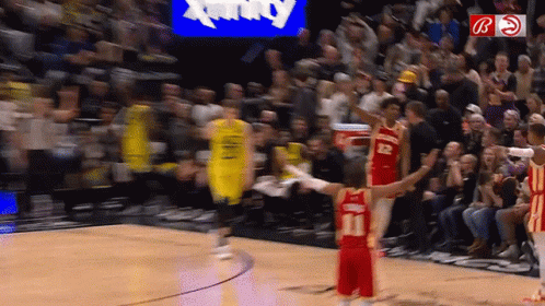 A Basketball Player With The Number 11 On The Back Of His Shirt GIF