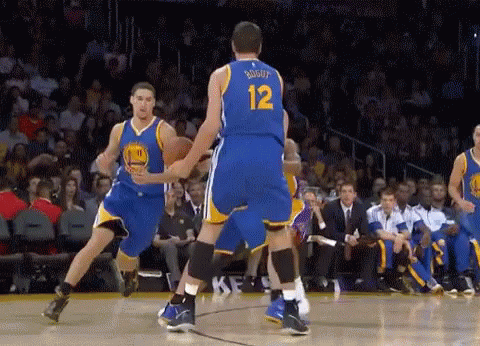 A Basketball Player With The Number 12 On His Back GIF