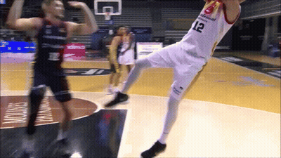 A Basketball Player With The Number 12 On His Shirt GIF