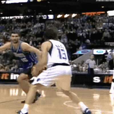 A Basketball Player With The Number 13 On His Jersey Is Dribbling The Ball GIF