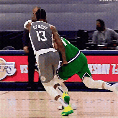 A Basketball Player With The Number 13 On His Jersey Is Fighting Another Player GIF