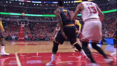 A Basketball Player With The Number 13 On His Jersey Is Playing Basketball GIF