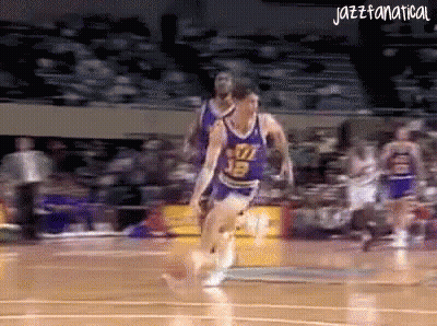 A Basketball Player With The Number 13 On His Jersey Runs On The Court GIF