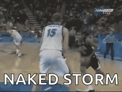 A Basketball Player With The Number 15 On His Jersey Is Dribbling The Ball . GIF