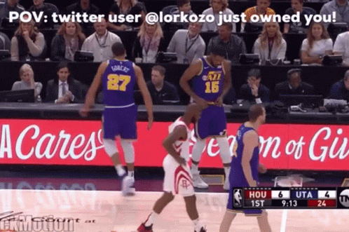 A Basketball Player With The Number 15 On His Jersey Stands On The Court GIF