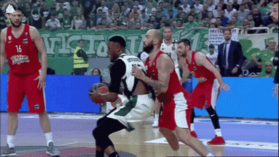 A Basketball Player With The Number 16 On His Jersey Is Dribbling The Ball GIF