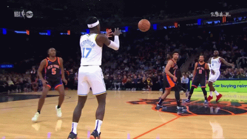 A Basketball Player With The Number 17 On His Back Is About To Throw The Ball GIF