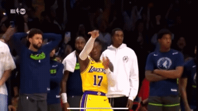 A Basketball Player With The Number 17 On His Jersey Stands In Front Of A Crowd GIF