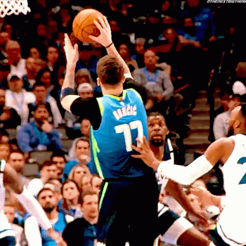 A Basketball Player With The Number 17 On His Jersey Throws A Basketball GIF