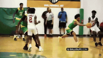 A Basketball Player With The Number 2 On His Back Is Dribbling The Ball GIF
