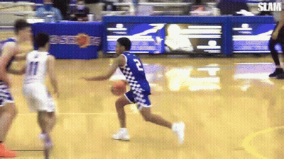 A Basketball Player With The Number 2 On His Jersey Is Running With The Ball GIF