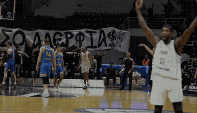 A Basketball Player With The Number 21 On His Jersey GIF