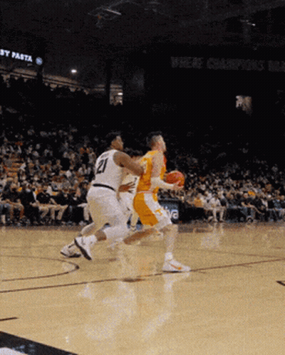 A Basketball Player With The Number 21 On His Shirt GIF