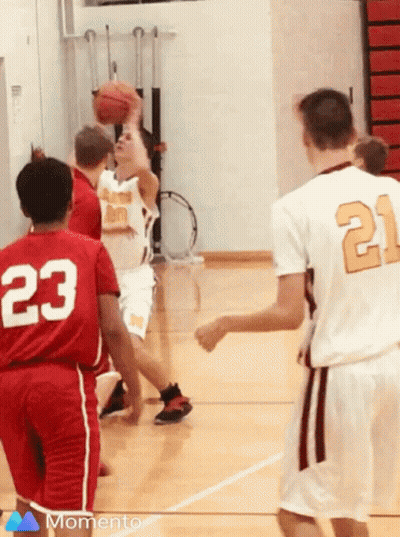 A Basketball Player With The Number 21 On The Back Of His Jersey GIF
